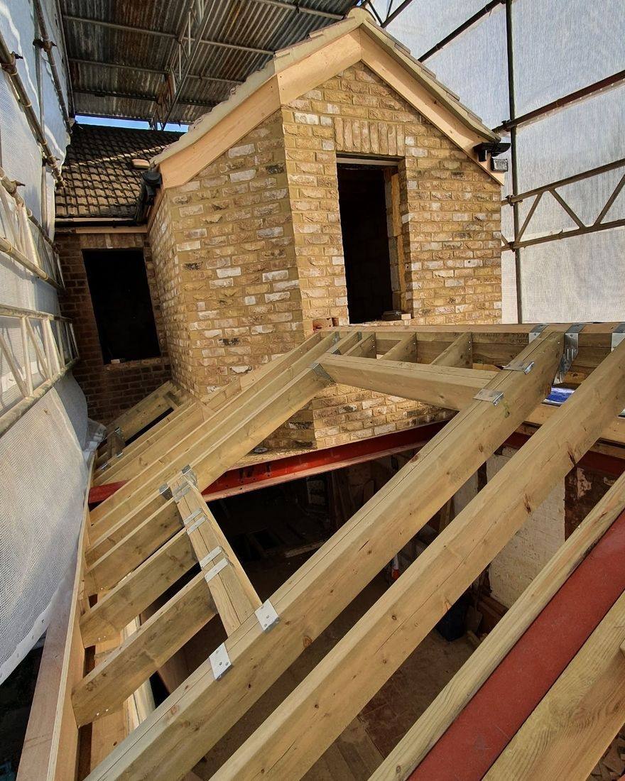 Brickwork and new roof structure on one of our own builds